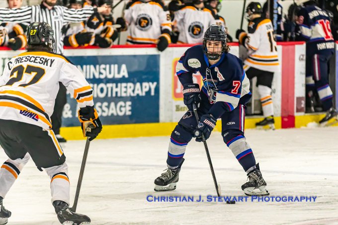 #7, 17-year-old Jason Sekulich wheels through the neutral zone against the Nanaimo Buccaneers Friday night in 3rd period VIJHL action. Sekulich and his Peninsula Panthers mates are now poised to take on the Victoria Cougars in the 1st Round, Best-of-7 Playoff series.